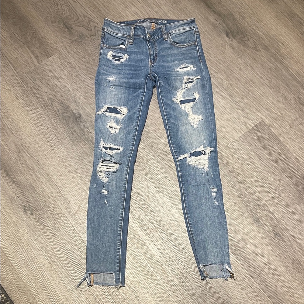 American Eagle Outfitters Distressed Blue Jeans super stretch super low jegging